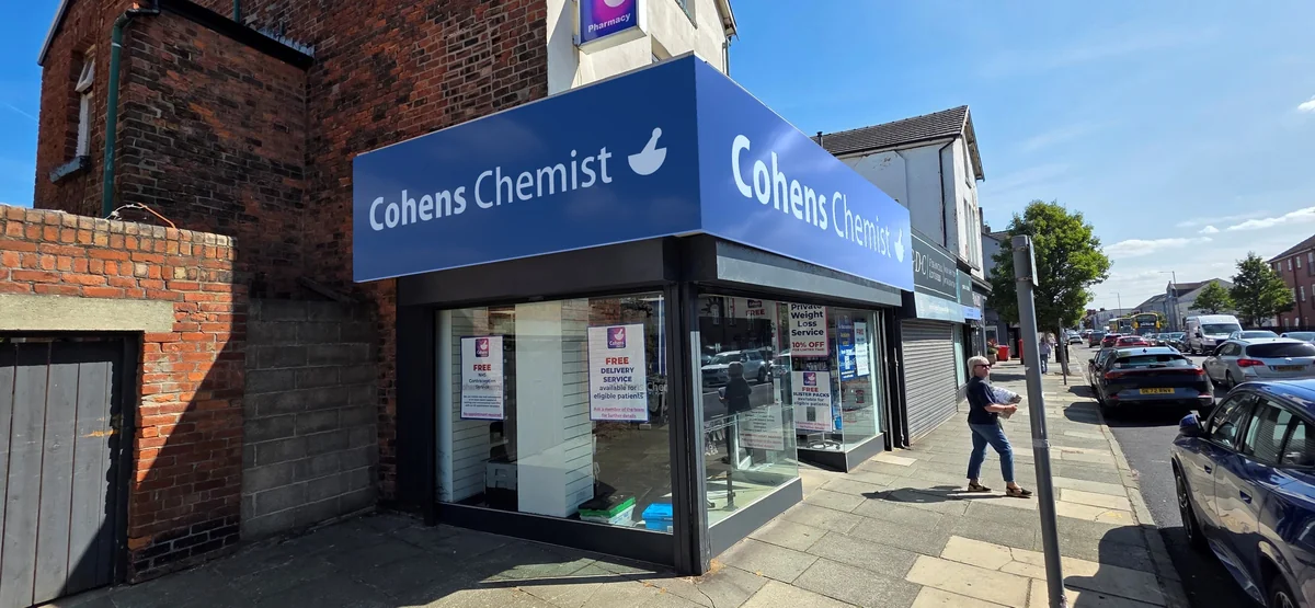 Cohens daytime proposal showing the sign on the building